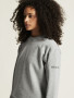 COMMUNITY 2.0 ROUNDNECK WOMAN